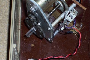 Plastic shaft to isolate the capacitor from the motor